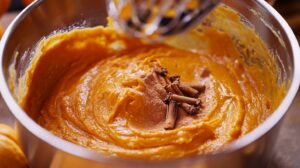 Add the pumpkin and spices - Paula Deen Pumpkin Cheesecake